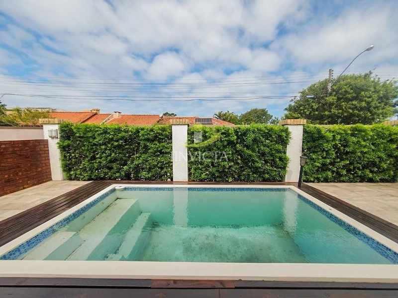 Casa com 3 Quartos e Piscina – Temporada em Xangri-Lá: 5ª foto da galeria de imagens do imóvel