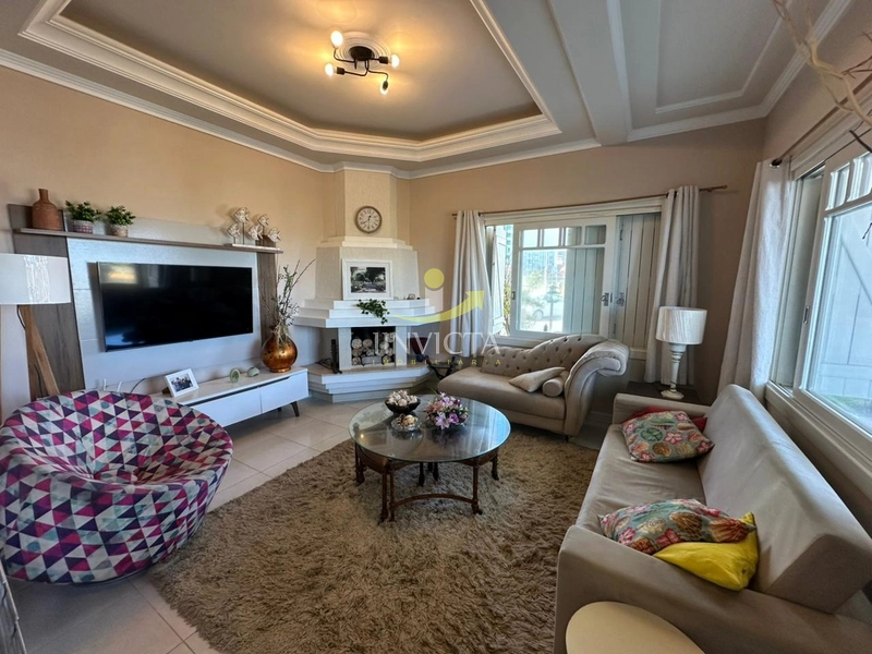 Sobrado com 4 dormitórios, 2 suítes – Frente à praça e ao mar!: 2ª foto da galeria de imagens do imóvel