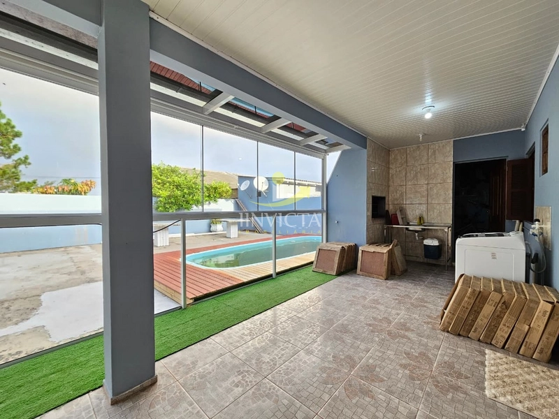 CASA EM ATLANTIDA SUL - 2 DORMITÓRIOS - COM PISCINA: 4ª foto da galeria de imagens do imóvel