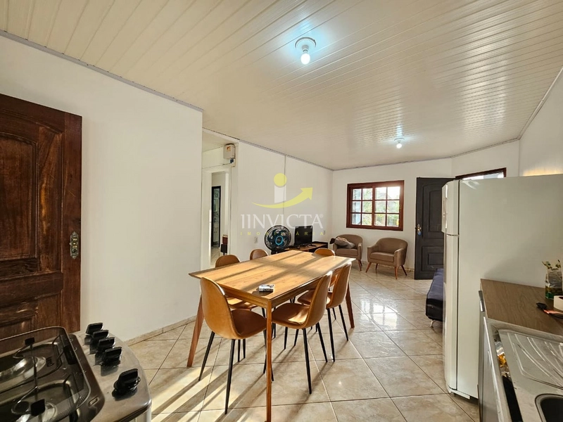 CASA EM ATLANTIDA SUL - 2 DORMITÓRIOS - COM PISCINA: 3ª foto da galeria de imagens do imóvel