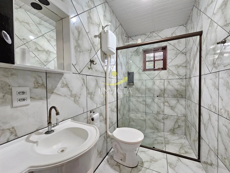 CASA EM ATLANTIDA SUL - 2 DORMITÓRIOS - COM PISCINA: 2ª foto da galeria de imagens do imóvel
