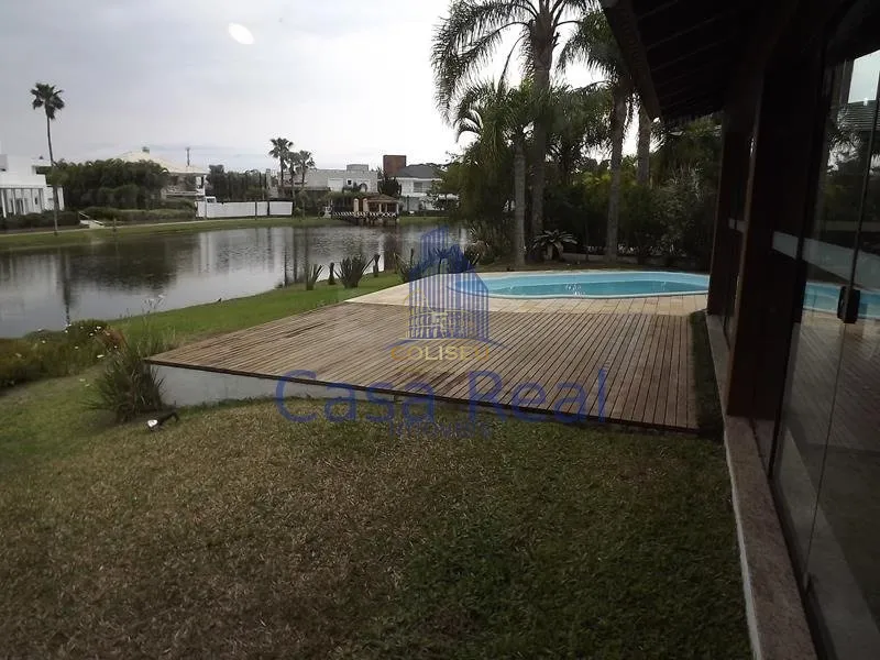 Beira lago: 7ª foto da galeria de imagens do imóvel