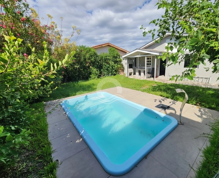 Casa 4 quartos piscina venda Zona Norte Capão da Canoa: 1ª foto da galeria de imagens do imóvel