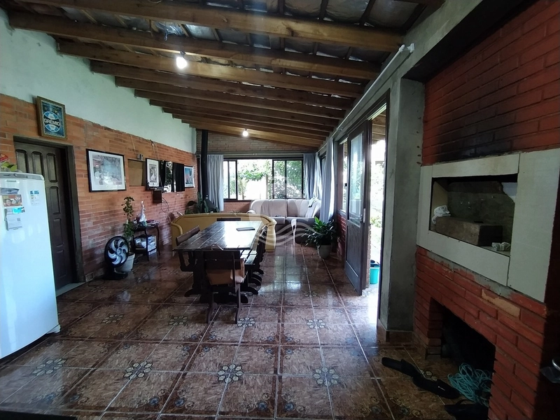 CASA COM 2 QUARTOS ADAPTADO PARA 3 NO CENTRO DE XANGRI-LÁ !!!: 8ª foto da galeria de imagens do imóvel