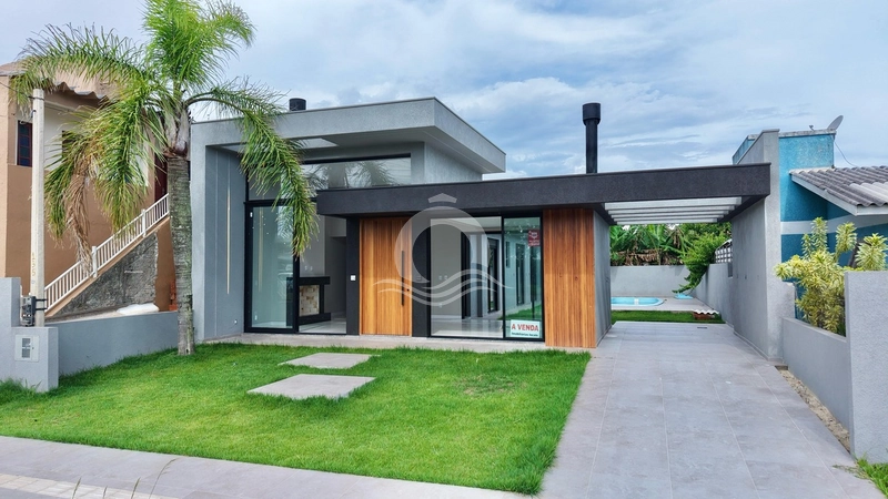 Casa com 03 suítes junto ao mar de Capão da Canoa: 1ª foto da galeria de imagens do imóvel