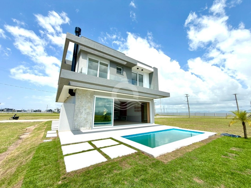 Casa 4 quartos beira lago piscina venda Rainha do Mar Xangri-Lá