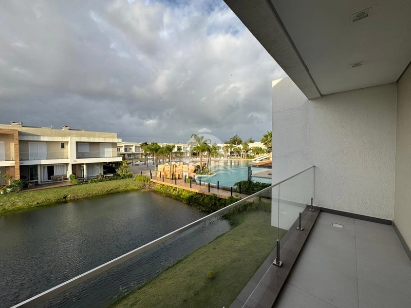 Casa condomínio 3 quartos beira lago venda Zona Nova Capão da Canoa