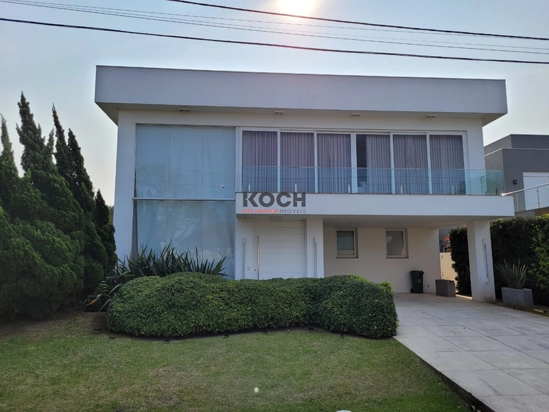 Sobrado 4 dormitórios no Condomínio Enseada, Xangri-lá: 1ª foto da galeria de imagens do imóvel