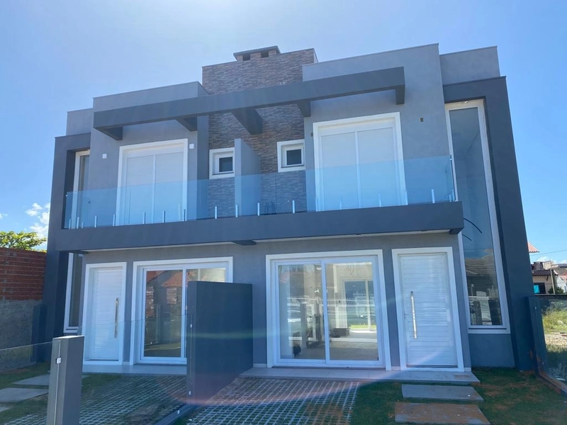 Casa geminada em Xangri-lá, 3 dormitórios: 2ª foto da galeria de imagens do imóvel