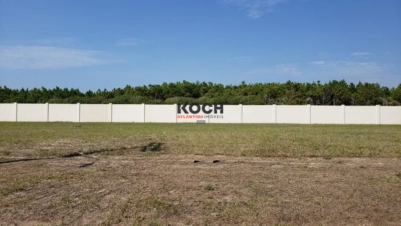 Terreno  463m² frente mar condomínio fechado
