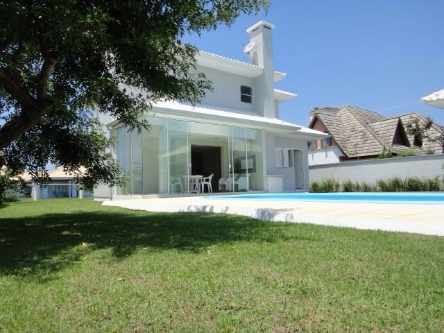 Sobrado em Atlântida, 4 dormitórios, com piscina: 9ª foto da galeria de imagens do imóvel
