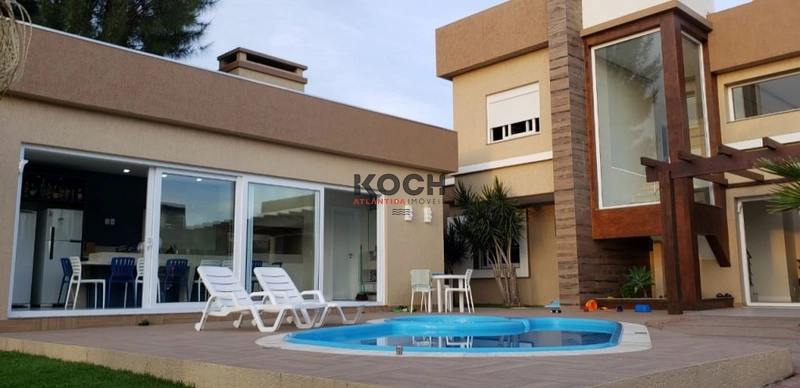 Sobrado com 05 suítes, piscina, em Atlântida: 2ª foto da galeria de imagens do imóvel