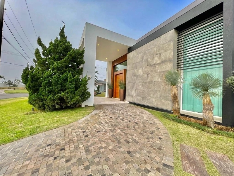 Casa com 4 suítes, no Condomínio Enseada em Xangri-lá RS: 4ª foto da galeria de imagens do imóvel