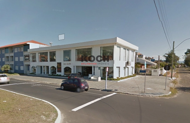 Prédio comercial de esquina em Atlântida: 1ª foto da galeria de imagens do imóvel