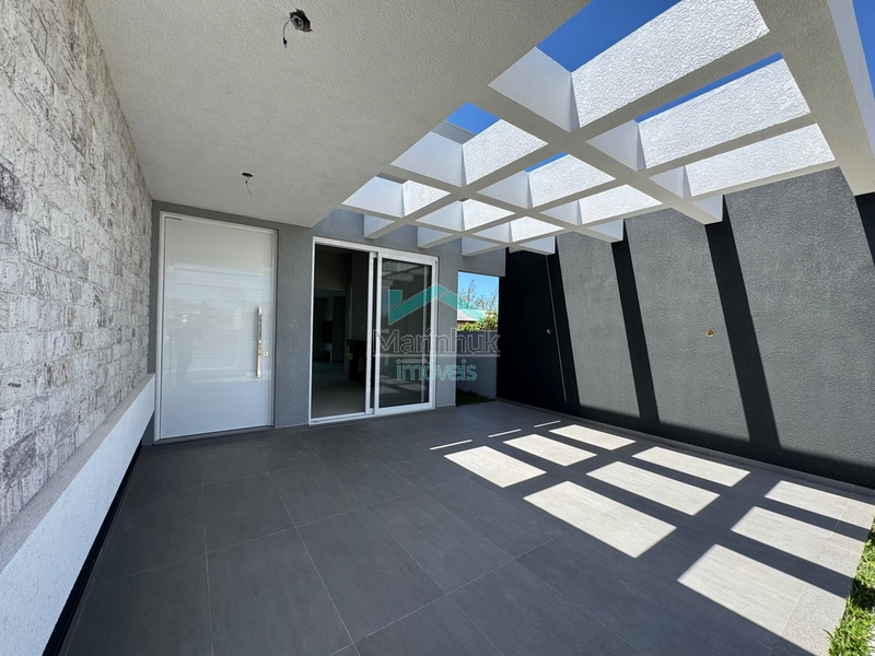 Casa em Atlântida Sul: 3ª foto da galeria de imagens do imóvel