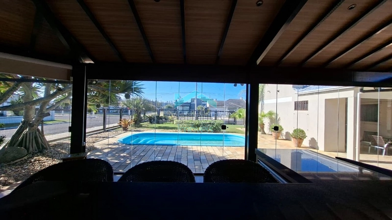 CASA COM 02 LOTES À VENDA EM ATLANTIDA SUL: 2ª foto da galeria de imagens do imóvel