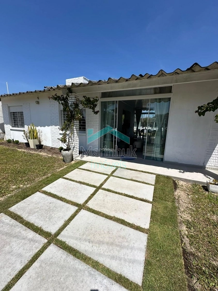 CASA À VENDA EM ATLANTIDA SUL: 1ª foto da galeria de imagens do imóvel