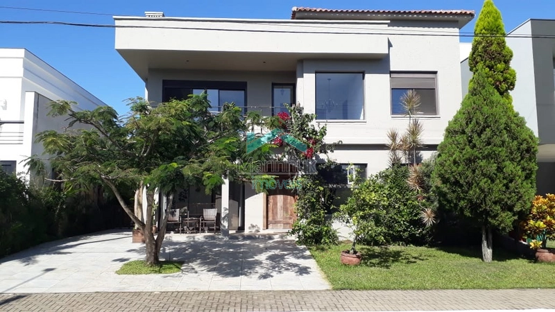 CASA NO CONDOMÍNIO VELAS DA MARINA: 1ª foto da galeria de imagens do imóvel