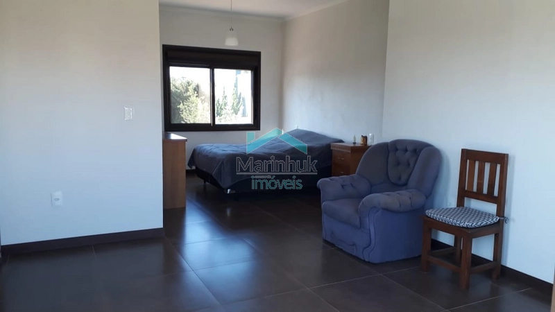 CASA NO CONDOMÍNIO VELAS DA MARINA: 2ª foto da galeria de imagens do imóvel