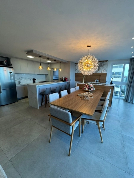 Apartamento de 4 suítes decorado em Torres: 2ª foto da galeria de imagens do imóvel