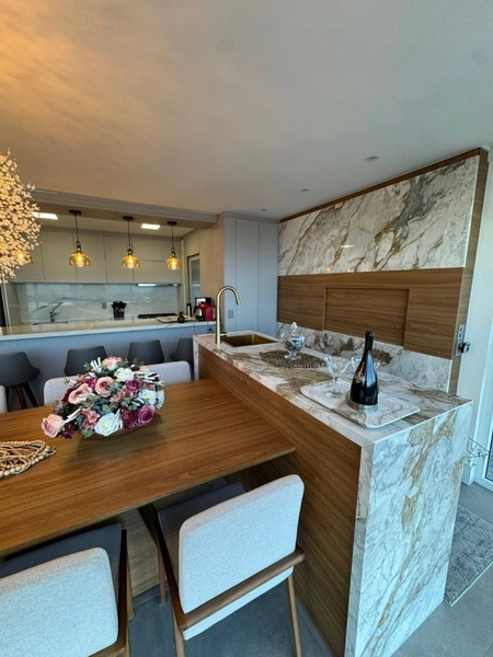 Apartamento de 4 suítes decorado em Torres: 3ª foto da galeria de imagens do imóvel