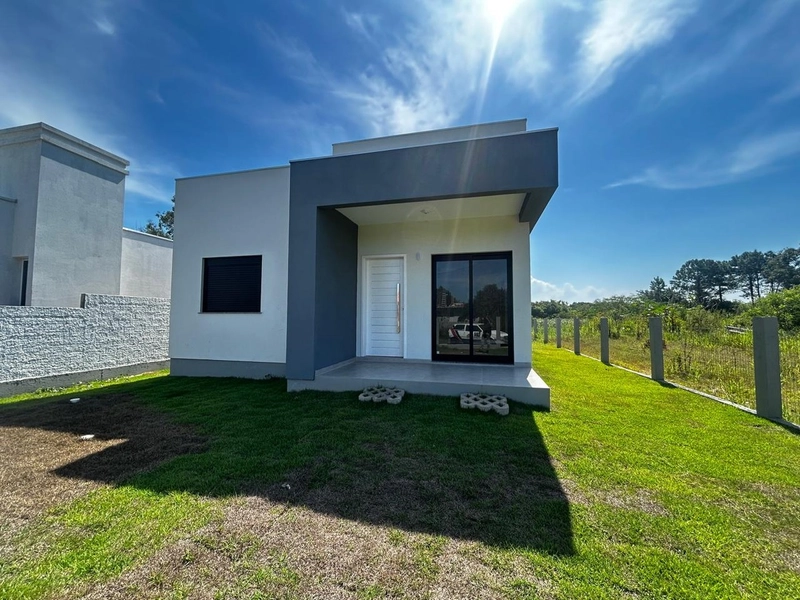 Casa em Passo de Torres  com 3 dormitórios: 2ª foto da galeria de imagens do imóvel