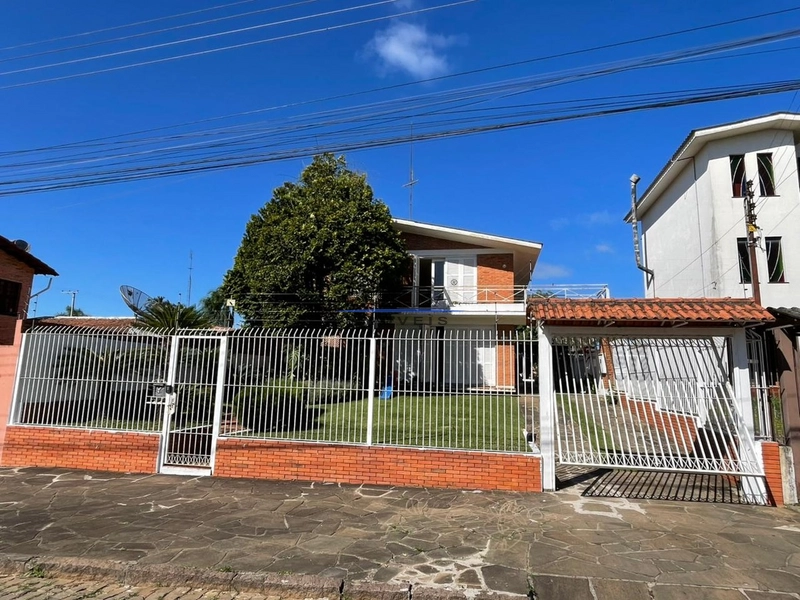 Desfrute de uma casa espaçosa e aconchegante,perfeita para sua família: 1ª foto da galeria de imagens do imóvel