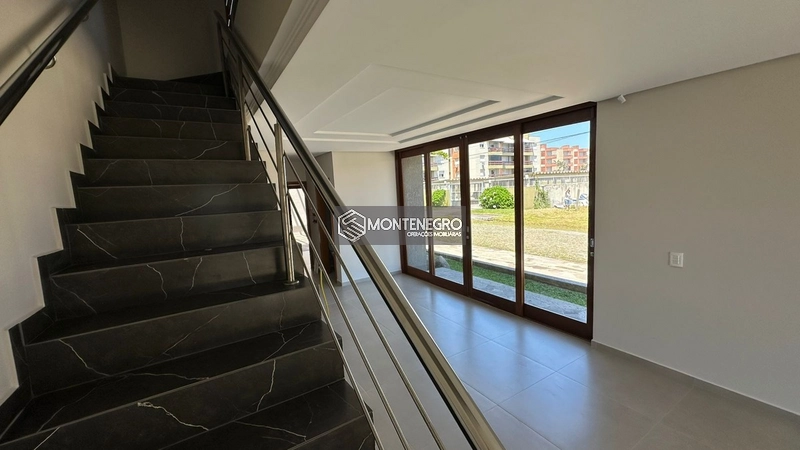 Sobrados Diferenciados!!! Rua Orquideas (50 metros do mar): 10ª foto da galeria de imagens do imóvel