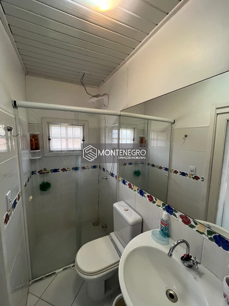 Estúdio em condomínio Capão Novo: 7ª foto da galeria de imagens do imóvel