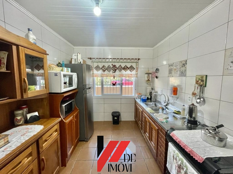 CASA LOCALIZADA NO BAIRRO ARAÇA, 4 DORMITÓRIOS, PRÓXIMO AO MAR.: 4ª foto da galeria de imagens do imóvel