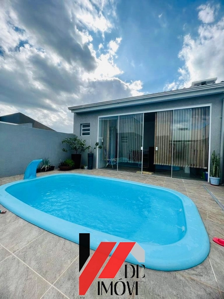 CASA COM PISCINA A VENDA EM CAPÃO DA CANOA: 1ª foto da galeria de imagens do imóvel