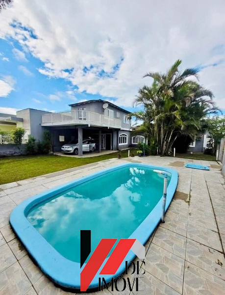 CASA DE ESQUINA COM 4 DORMITÓRIOS E PISCINA NO BAIRRO GUARANI: 1ª foto da galeria de imagens do imóvel