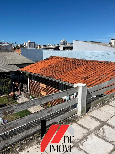 TERRENO COM TRES CASAS!: 14ª foto da galeria de imagens do imóvel