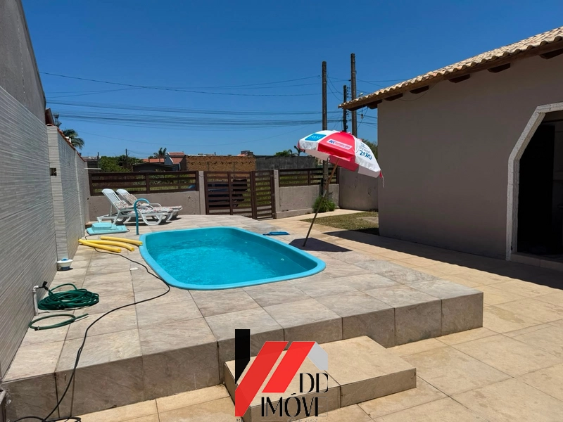 CASA EM TERRENO INTEIRO COM PISCINA: 1ª foto da galeria de imagens do imóvel