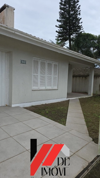 CASA COM 3 DORMITÓRIOS E 2 SUÍTES: 2ª foto da galeria de imagens do imóvel