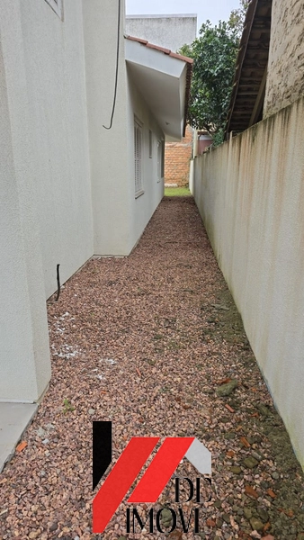 CASA COM 3 DORMITÓRIOS E 2 SUÍTES: 4ª foto da galeria de imagens do imóvel