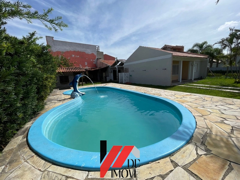 CASA COM 2 TERRENOS, PISCINA. 2 QUADRAS DO MAR: 10ª foto da galeria de imagens do imóvel