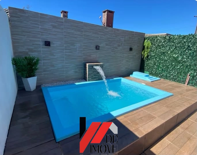 CASA COM PISCINA E AR CONDICIONADO!!: 4ª foto da galeria de imagens do imóvel