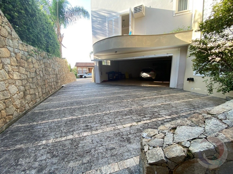 Casa residencial localizada no Bairro Cacupé. Condomínio fechado: 49ª foto da galeria de imagens do imóvel