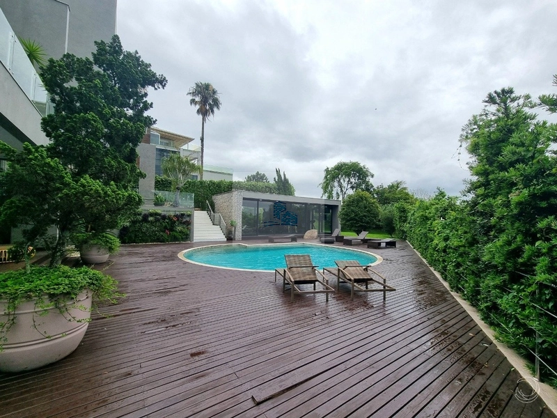 Casa Alto Padrão com 4 suítes em Cacupé: 40ª foto da galeria de imagens do imóvel