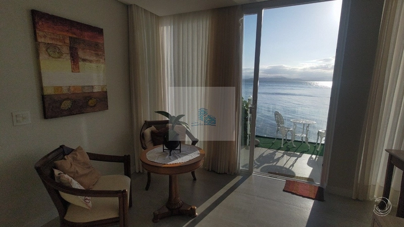 Casa com vista mar e 3 suítes em Cacupé: 7ª foto da galeria de imagens do imóvel