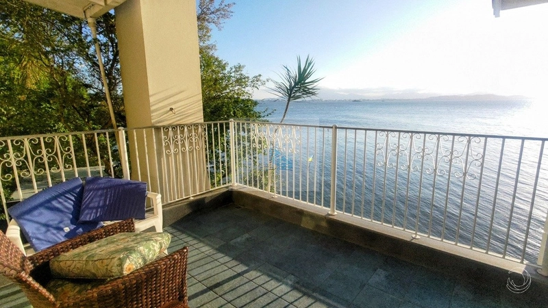 Casa com vista mar e 3 suítes em Cacupé: 1ª foto da galeria de imagens do imóvel