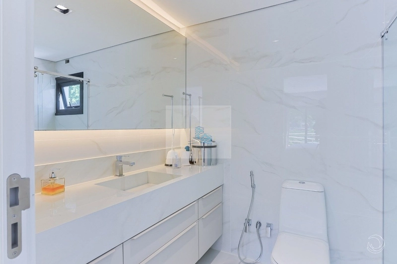 Casa em condomínio fechado com 5 suítes em Cacupé: 24ª foto da galeria de imagens do imóvel