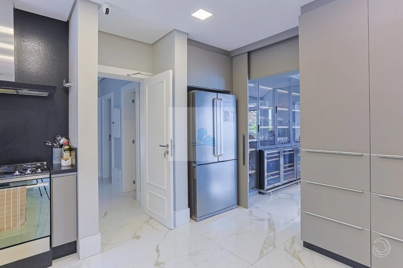Casa em condomínio fechado com 5 suítes em Cacupé: 12ª foto da galeria de imagens do imóvel