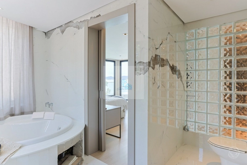 Casa em condomínio fechado com 5 suítes em Cacupé: 21ª foto da galeria de imagens do imóvel