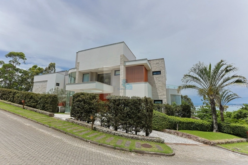 Casa em condomínio fechado com 5 suítes em Cacupé: 39ª foto da galeria de imagens do imóvel