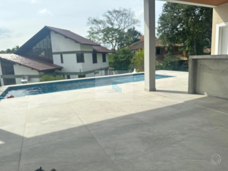 Casa Resdencial de 332m² com4 quartos em Cacupé: 3ª foto da galeria de imagens do imóvel