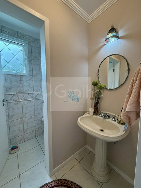 Casa de 295m² com 3 suítes em Cacupé: 15ª foto da galeria de imagens do imóvel