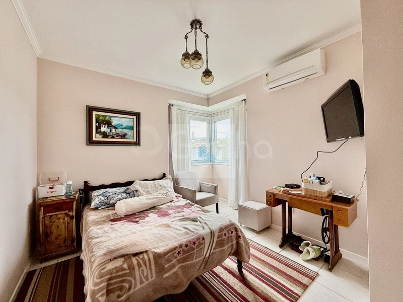 Casa de 295m² com 3 suítes em Cacupé: 14ª foto da galeria de imagens do imóvel