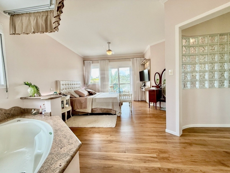 Casa de 295m² com 3 suítes em Cacupé: 19ª foto da galeria de imagens do imóvel